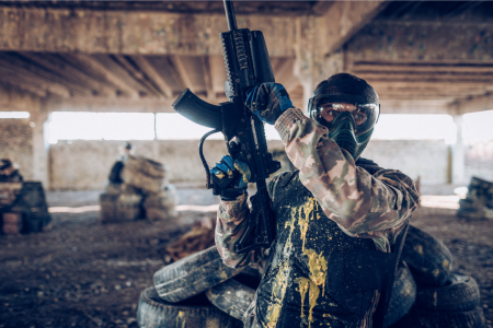 paintball player in old warehouse